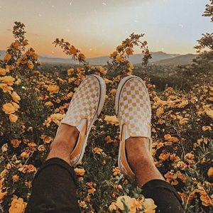 Vans Classic Checkerboard Slip-Ons In Yellow 